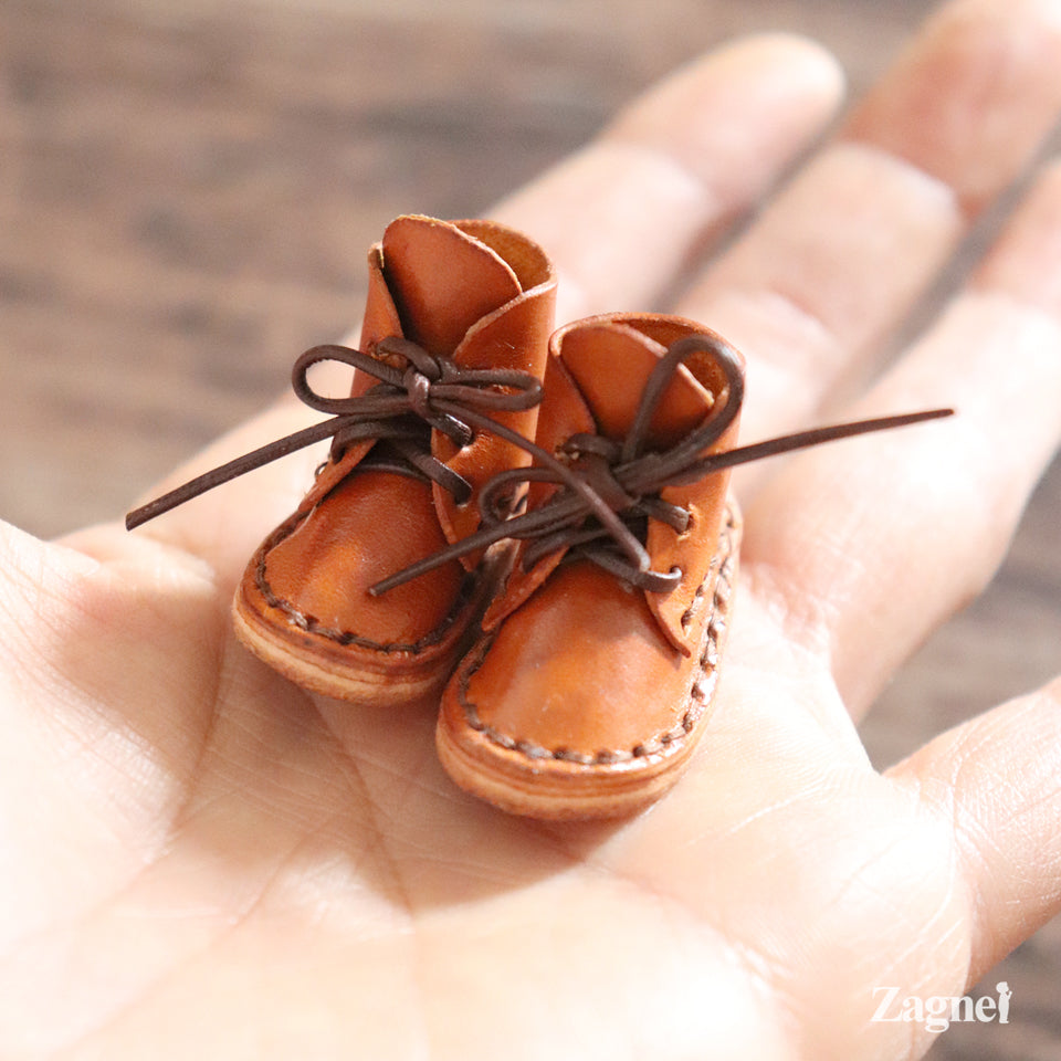 Miniature leather shoes
