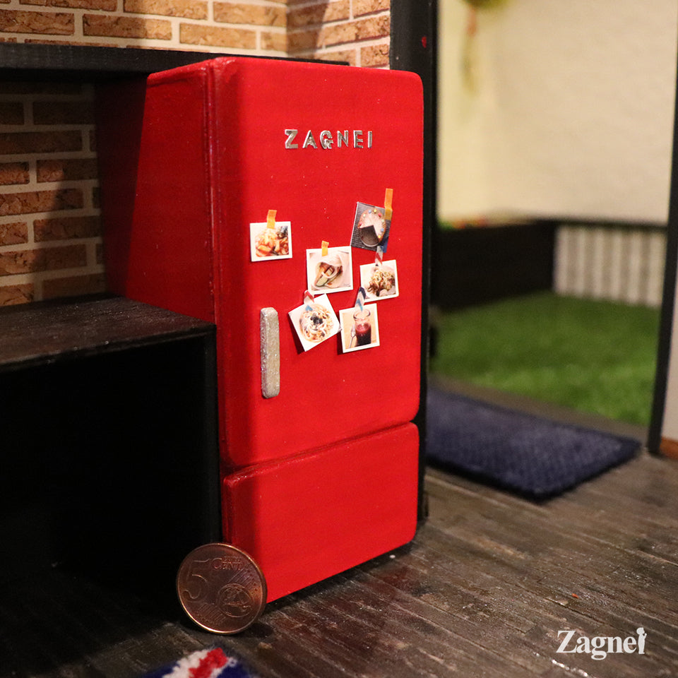 Miniature refrigerator with a light